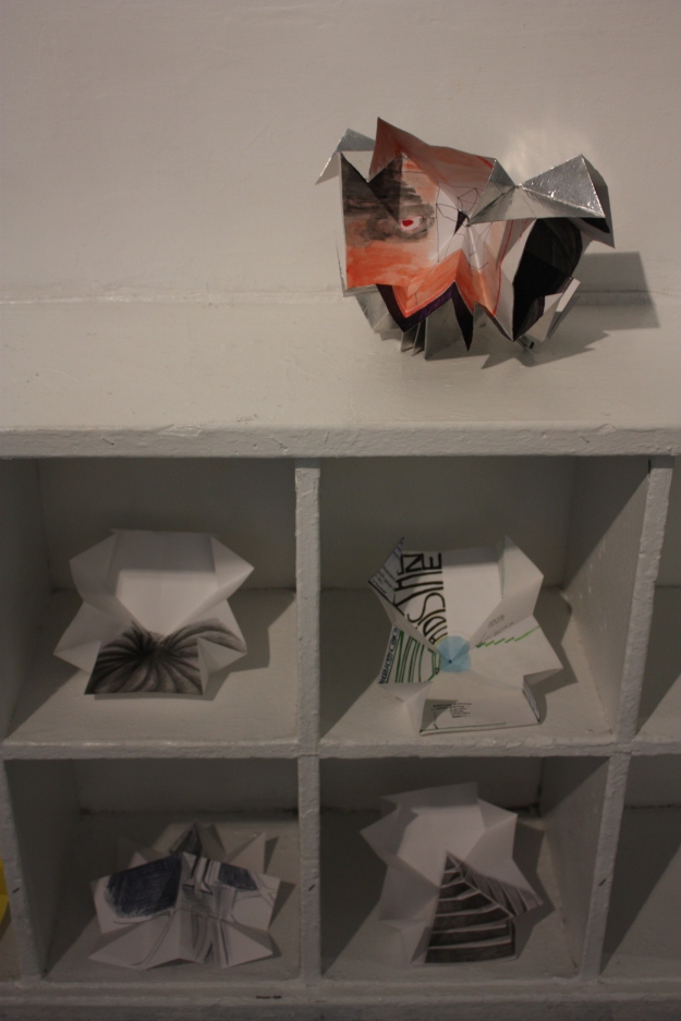 Annex with Chronicles of the Everything Vault (paper sculpture).